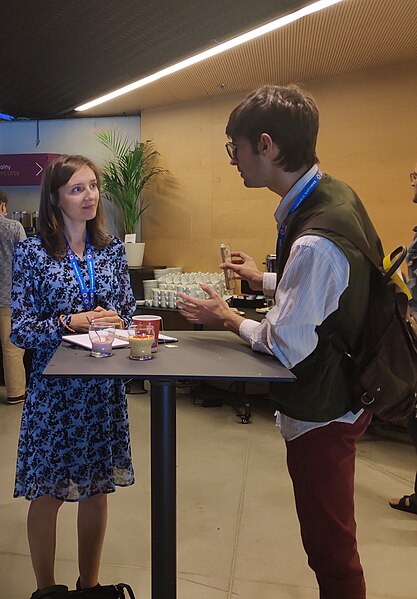 File:Rina.sl and Matteo Enea shooting a video about Wikimania 2024 04.jpg