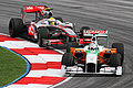 Pursued by Lewis Hamilton at the 2010 Malaysian GP.