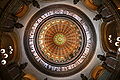 Image 35The dome of the Illinois State Capitol. Designed by architects Cochrane and Garnsey, the dome's interior features a plaster frieze painted to resemble bronze and illustrating scenes from Illinois history. Stained glass windows, including a stained glass replica of the State Seal, appear in the oculus. Ground was first broken for the new capitol on March 11, 1869, and it was completed twenty years later. Photo credit: Daniel Schwen (from Portal:Illinois/Selected picture)