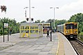 A Merseyrail Class 507 arrives with a service from Southport.