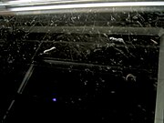 Cloud chamber with visible tracks from ionizing radiation (short, thick: α-particles; long,