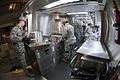 Georgia Air National Guard cooks preparing Unitized Group Rations in a trailer kitchen