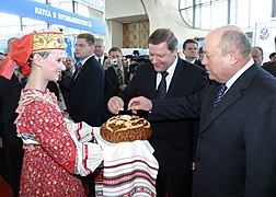 Russian Prime Minister Mikhail Fradkov and his Belarussian counterpart Sergei Sidorsky (from right to left) at the opening of a Russian national exposition underway in Minsk as part of the first Russian-Belarussian economic forum.