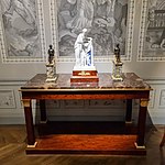 Empire console table; 1804–1814; mahogany, gilded bronze, chiseled gilded bronze and fossil gray marble; 91.5 x 154 x 73.5 cm; Musée des Arts Décoratifs (Paris)[64]