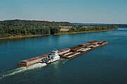 Towboat Dakota Storm upbound on Ohio River at Matthew E. Welsh Bridge (4 of 4), near Mauckport, Indiana, USA, 1987