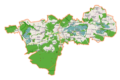 Mapa konturowa gminy Milicz, blisko centrum na dole znajduje się punkt z opisem „Pałac w Postolinie”