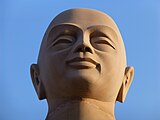 Statue of Upāli at Bodh Gaya