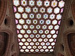 The Senate foyer ceiling, made in a Tudor-style stone tracery filled with stained glass.