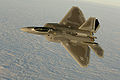 Capt. Chris Batterton aggressively banks his F-22A Raptor during a basic fighting maneuver training mission off the Virginia coast last week. The captain is with the 27th Fighter Squadron, the Air Force's first unit to fly the Raptor.