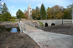 Brigs ower Vigala River. Rapla kirk in the backgrund.