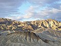 "Zabriskie_Point_at_sunrise_in_Death_Valley_NP.JPG" by User:Lokal Profil