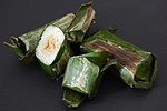 Lemper adalah makanan ringan berupa beras ketan dengan isi daging ayam