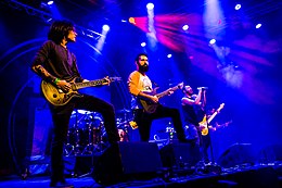 Periphery performing in 2015. Left to right: Mark Holcomb, Jake Bowen, Spencer Sotelo, Adam Getgood, Misha Mansoor