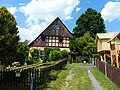 Wohnstallhaus mit Frackdach und Fachwerkobergeschoss in Martinlamitz