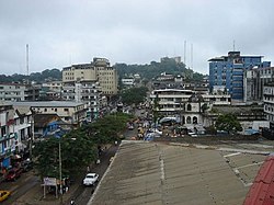 Broad Street, Monrovia, Liberia. The Old Ducor Hotel is visible in the background.