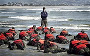 First Phase A Navy SEAL Instructor in Class 245 provides a lesson to his trainees on listening to instruction.