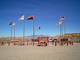 The Four Corners Monument, with Ute Mountain in the distance