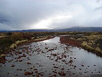 Le río Agrio croisant la route RP21.