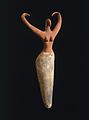 Image 25Naqada figure of a woman interpreted to represent the goddess Bat with her inward curving horns. Another hypothesis is that the raised arms symbolize wings and that the figure is an early version of the white vulture goddess Nekhbet, c. 3500–3400 B.C.E. terracotta, painted, 11+1⁄2 in × 5+1⁄2 in × 2+1⁄4 in (29.2 cm × 14.0 cm × 5.7 cm), Brooklyn Museum (from Prehistoric Egypt)