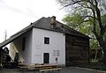 Hencz mill, the wall of the mill with a plaque dedicated to György Hencz, a former owner, taken from the east, Zalaegerszeg, 2005