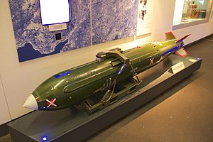 Image shows a museum exhibit of a WE.177, which was Britain's last free-fall nuclear bomb. The example shown is a decommissioned training example, re-painted in its 'live' green colour scheme. It is on display at the Imperial War Museum North, in Manchester, England.