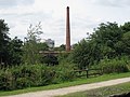 Junction Mills chimney viewed from the Peak Forest Canal Taken on 8 Aug. Uploaded by me on 29 Dec 2009.