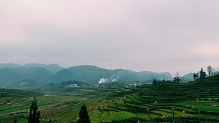 Rural fieldscape in Puding County, Guizhou Province, China.jpg