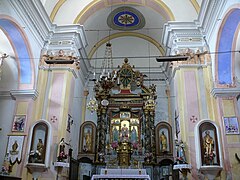 Le chœur de l'église avec le retable de saint Laurent attribué à Andrea de Cella[46].