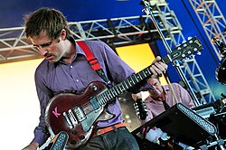 Battles performing live in McCallum Park In 2012. From left to right: Williams, Stanier