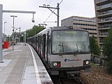 Een tweewagentrein RSG2 op lijn E richting Den Haag Centraal, op het toen nog ingebruik zijnde station Hofplein.