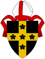 Sable, a cross Or with five cinquefoils sable