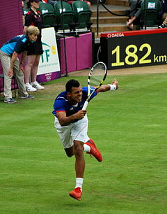 Tsonga hitting a running forehand return.