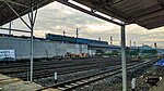 Two DF4B and one DF4C locomotives passing Padalarang Station, Indonesia