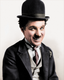 Chaplin in his costume as "the Tramp"