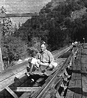 A United States Forest Service employee "shoots the chute".