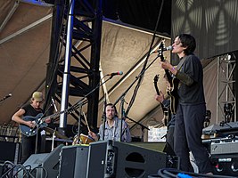 Big Thief performing onstage