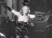 Rita Hayworth wearing a black dress in the "Put the Blame on Mame" number from Gilda