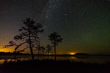 In the photo there is one Perseid, Milky Way and Andromega galaxy and light pollution on the horizon - Luhasoo bog in Estonia.jpg