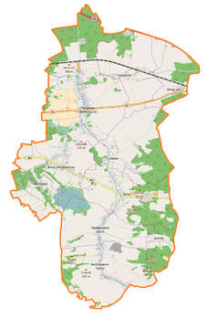 Mapa konturowa gminy Warta Bolesławiecka, blisko centrum na lewo u góry znajduje się punkt z opisem „Dwór w Tomaszowie Bolesławieckim”