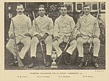 Team photograph of a rifle shooting team, in black and white.