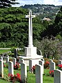 The Cross of Sacrifice is a Grade II listed structure, designed by Sir Reginald Blomfield circa 1922.[8]