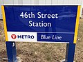 The station's entrance sign on the northwest side.