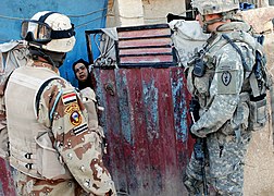 Iraqi Security Forces, Multi-National Division - Baghdad Soldiers patrols the neighborhood of Abu Ghuraib DVIDS136506.jpg