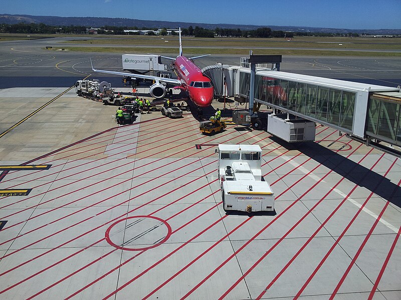 File:OIC adelaide airport plane at gate.jpg