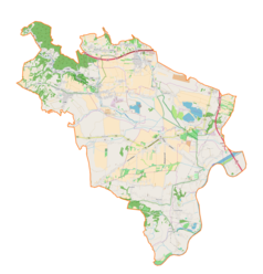 Mapa konturowa gminy Liszki, blisko centrum na lewo znajduje się punkt z opisem „Zarzecze”