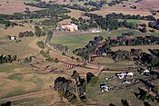 Murwillumbah Railway Line north of Lismore sweeping past Woodlawn College.