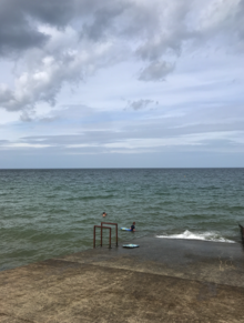 Sea swimmers on Sheringham seafront, East Anglia