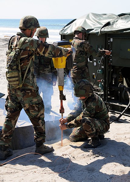 File:US Navy 090328-N-1424C-776 Seabees assigned to Amphibious Construction Battalion (ACB) 1 assemble a reverse osmosis water purification unit.jpg