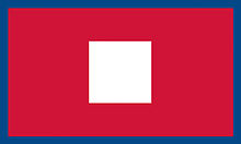 drapeau rouge comportant un carré blanc au centre