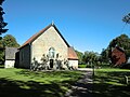 Skalunda kyrka (t.v. strax utanför bild en gravhög och en stensättning), Kållands härad, Västergötland.